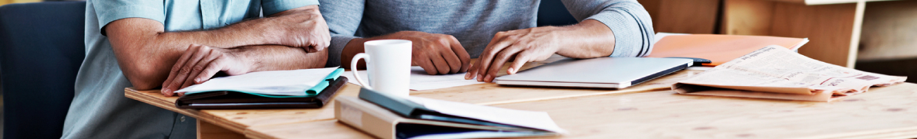 Two men working at a desk